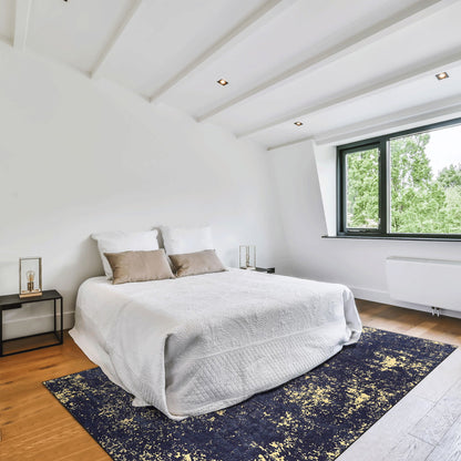 Maval - 6' X 9' Washable Area Rug - Black / Gold